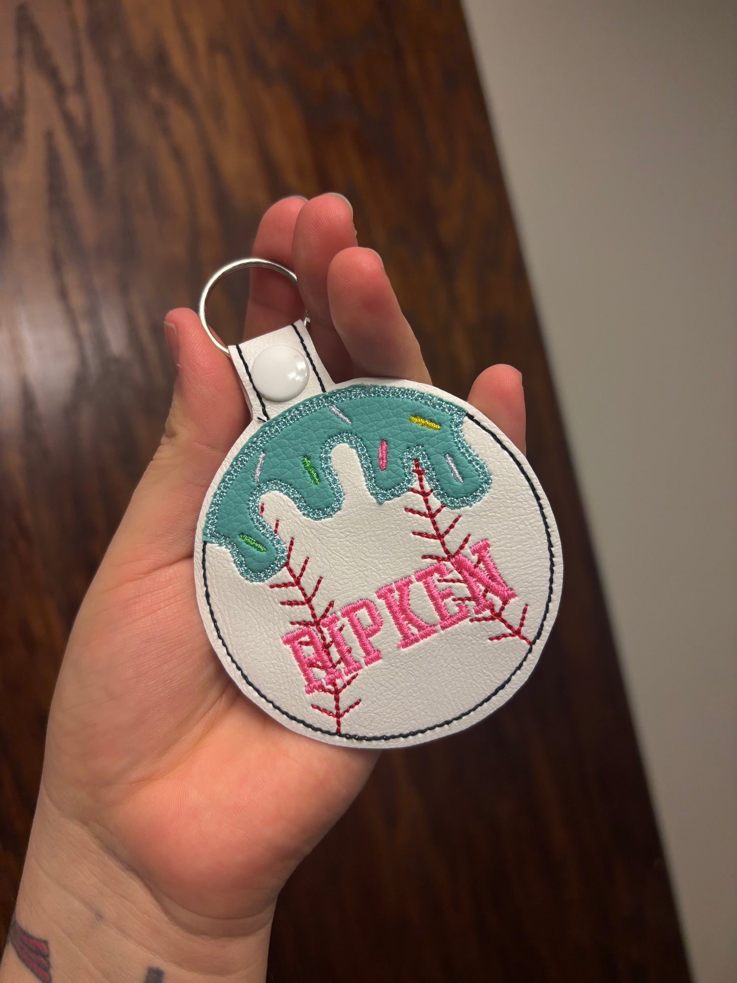 Embroidered drip sport bag tag